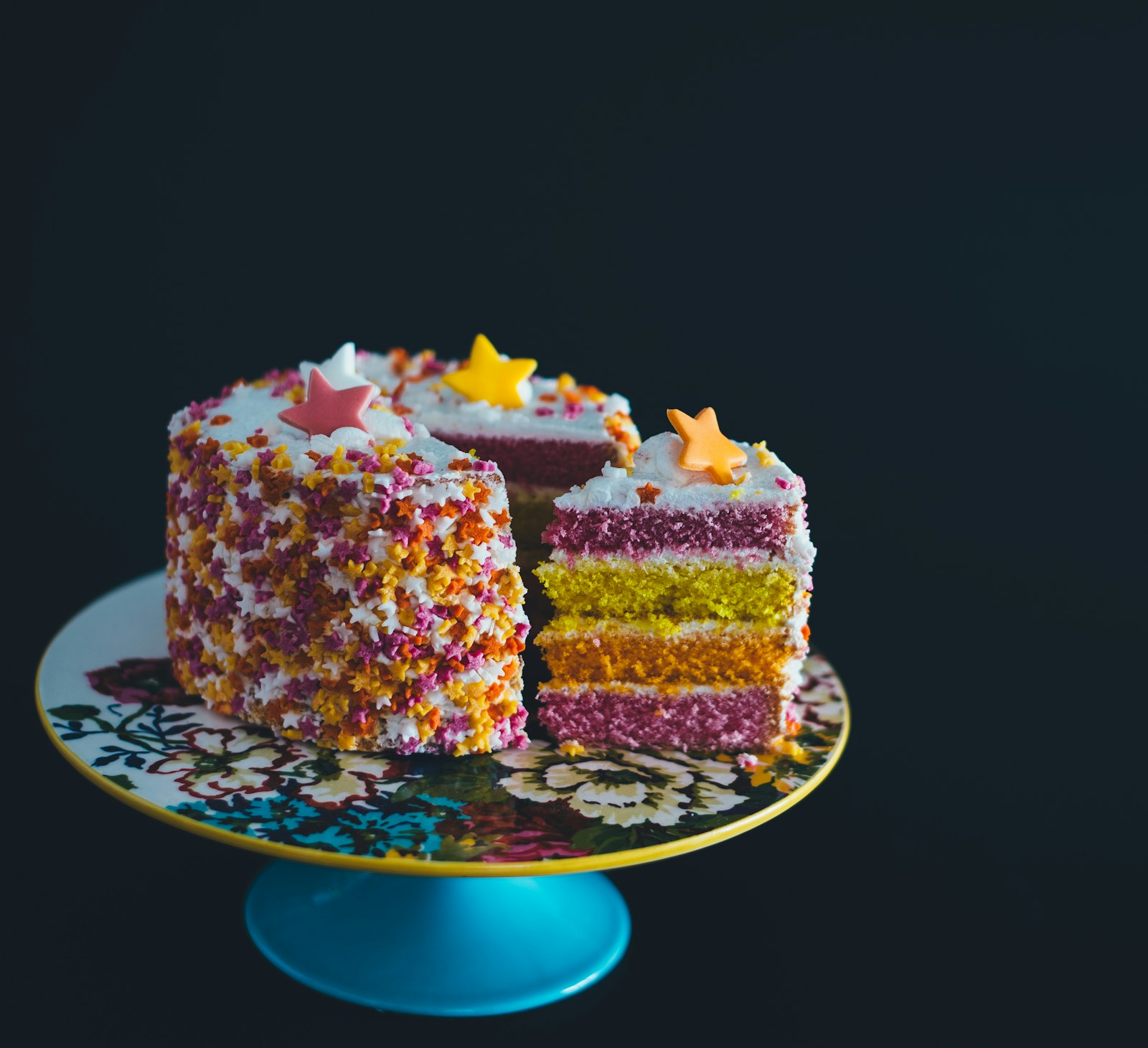 A birthday cake with lit candles